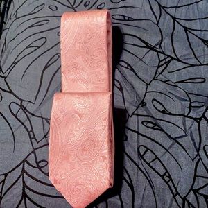 Pink MK tie as you see is not too big not too small